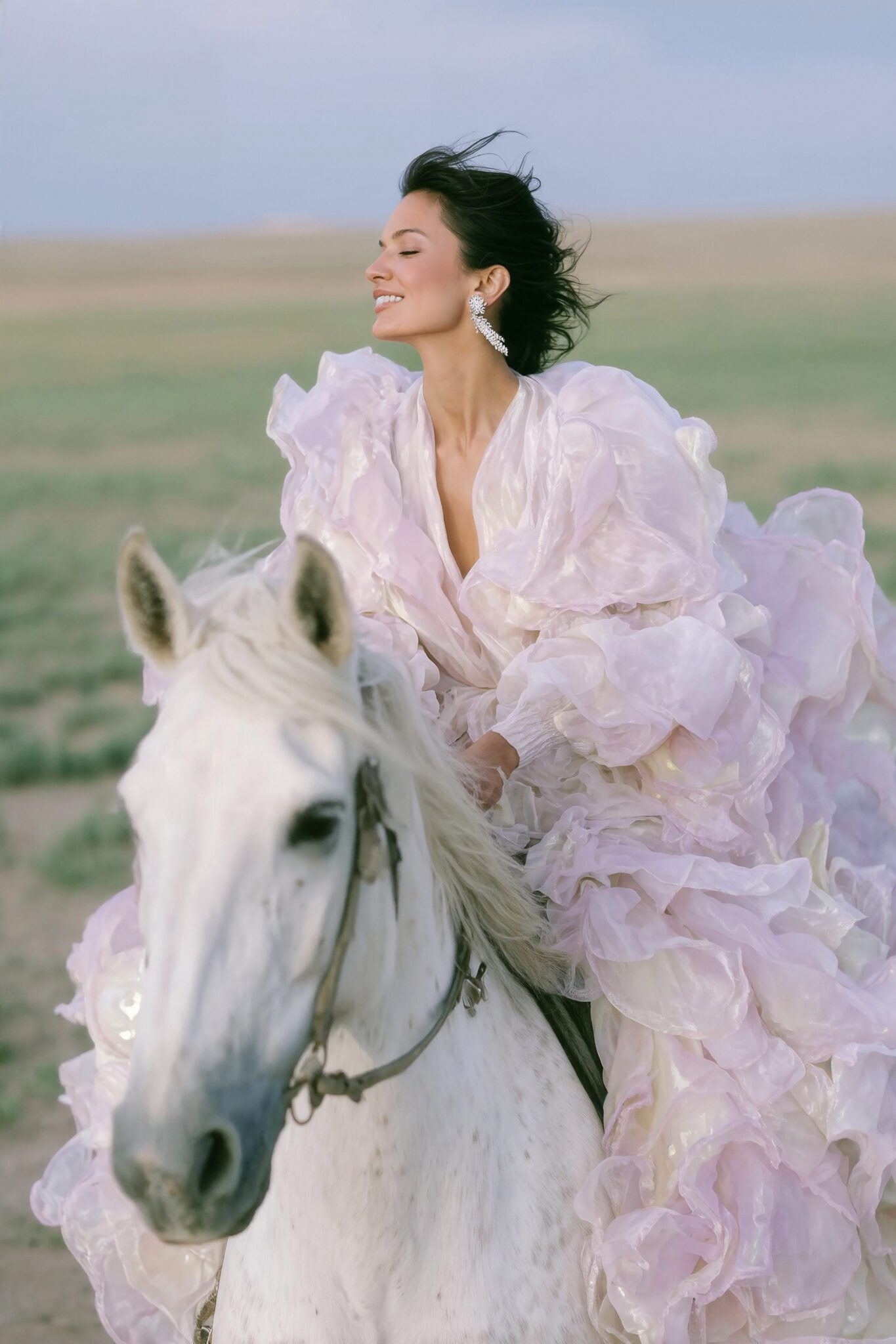 AI bridal editorial of woman on white horse in pastel ruffled gown, cinematic outdoor lighting